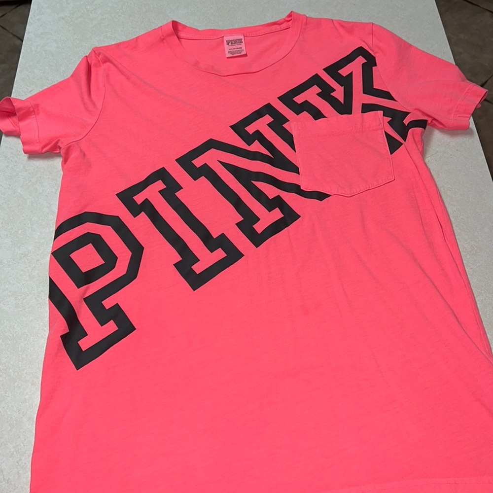Small PINK, T-shirt. Fits like a Medium/Large
